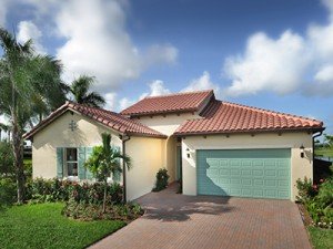 House exterior and garage at Minto PortoSol in Royal Palm Beach, Florida