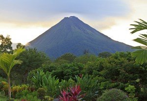 A lush garden in La Fortuna, Costa Rica with Arenal Volcano in the background