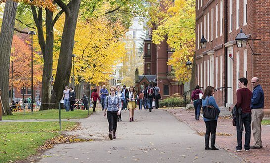 CAMBRIDGE, MA, USA - NOVEMBER 2, 2013: Harvard Yard, old heart of Harvard University campus, on a beautiful Fall day in Cambridge, MA, USA on November 2, 2013.