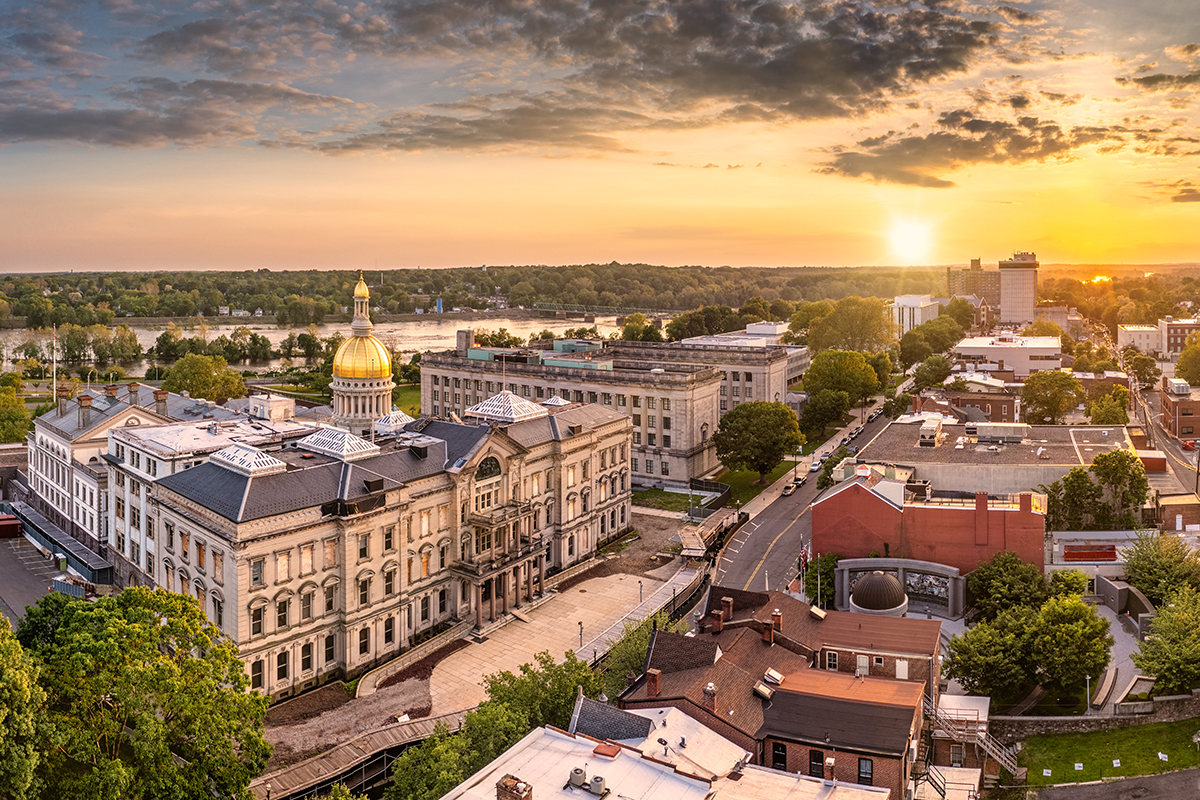 Aerial panorama of Trenton New Jersey skyline and state capitol at sunset. Trenton is the capital city of the U.S. state of New Jersey and the county seat of Mercer County.
