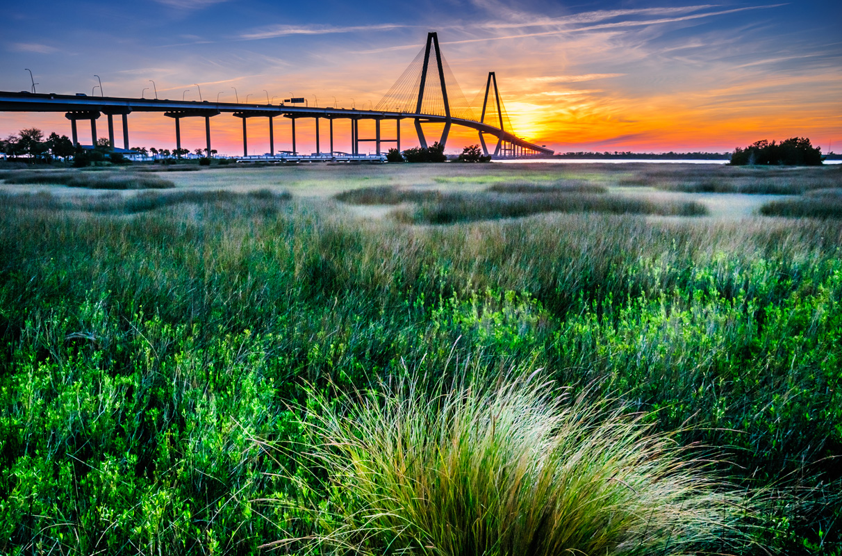 The Ravenel Bridge crosses the Cooper River and connects Charleston with Mount Pleasant South Carolina. It is 13,200 feet long (2.5 miles) and is the third longest cable stayed bridge in the Western Hemisphere.