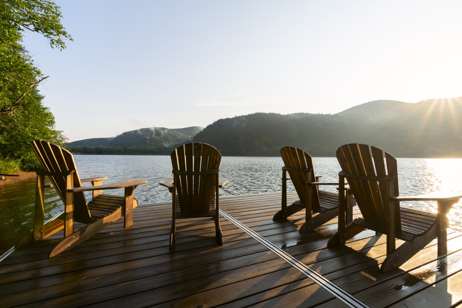 Adirondack deck chairs on lake dock in Parc National du Mont-Tremblant